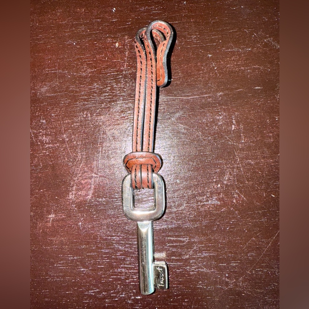 Fossil key charm